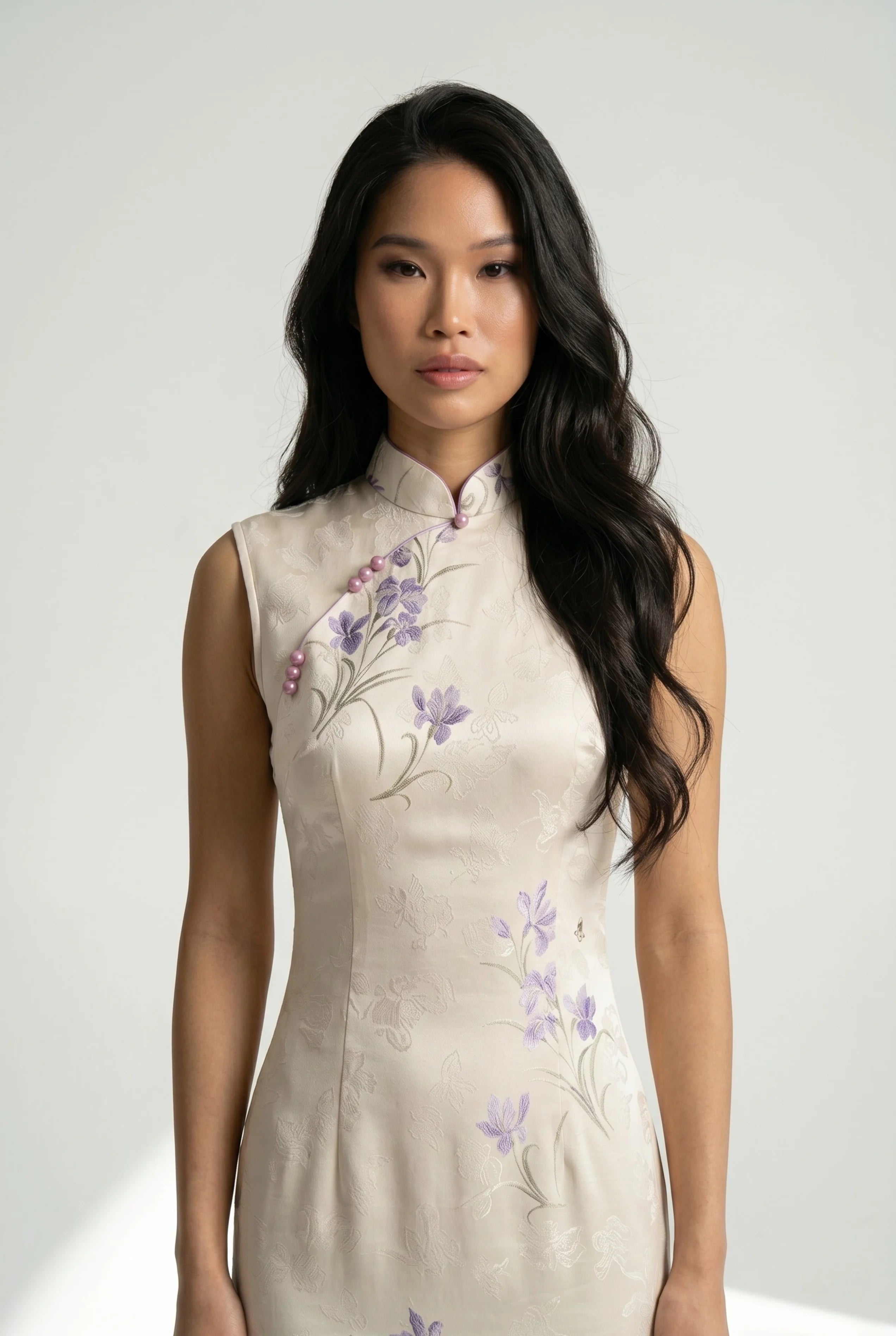 Close-up front view highlighting the high mandarin collar and delicate purple floral embroidery on the white bodice
