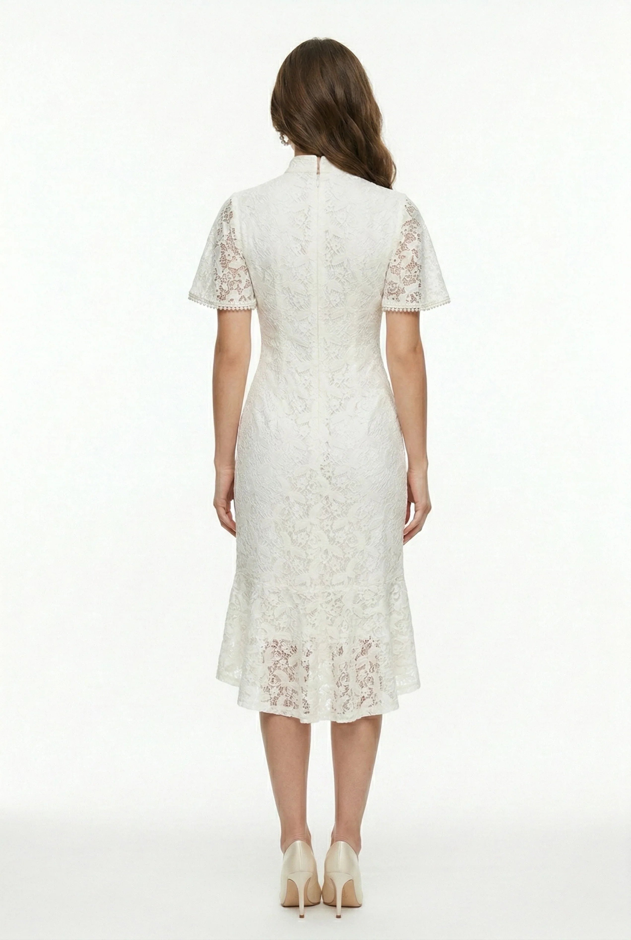 Fitted back view of a white lace asymmetrical cheongsam dress