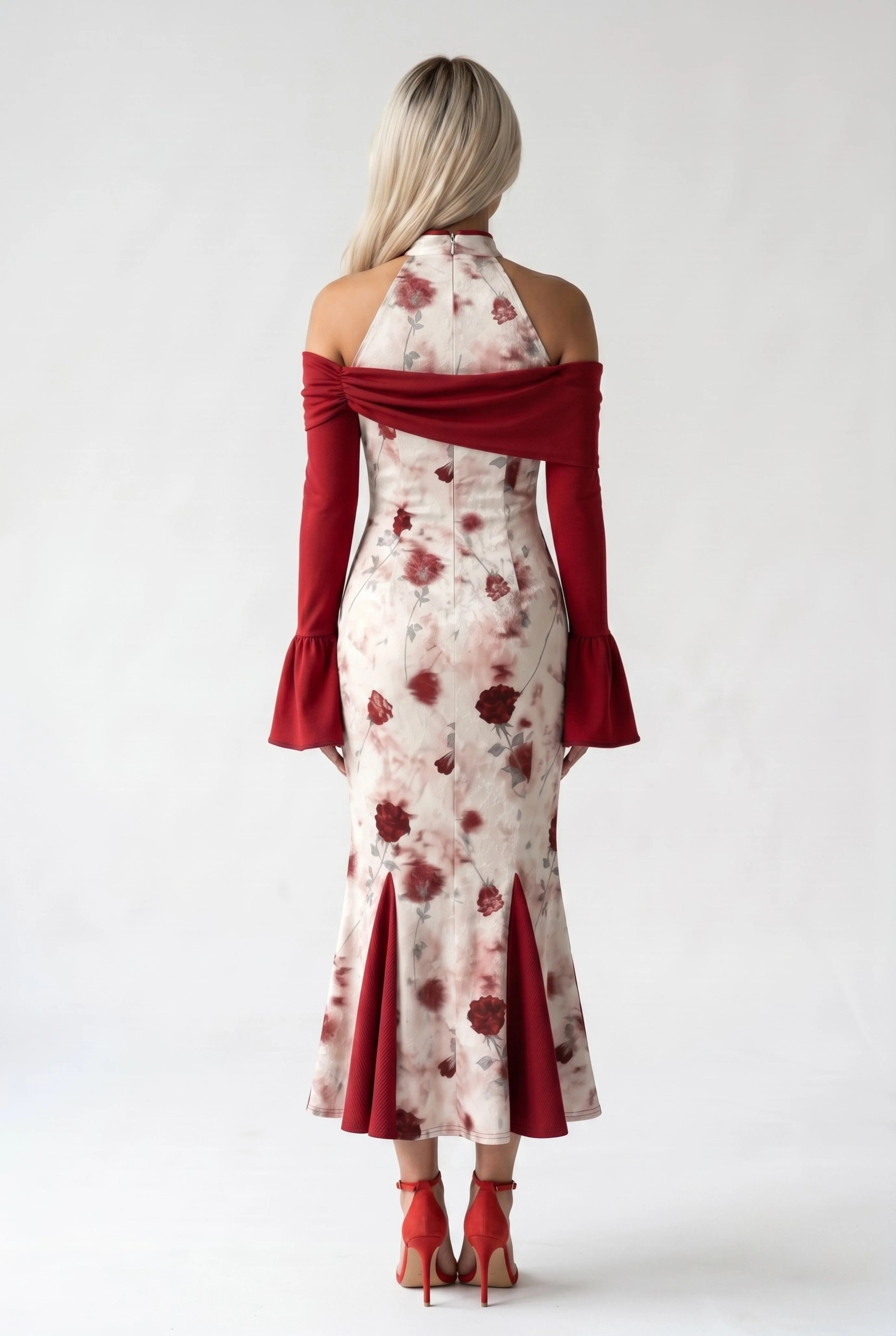 Full-length back view of the white and red qipao dress showing the form-fitting cut, draped red shawl design, and flared hem