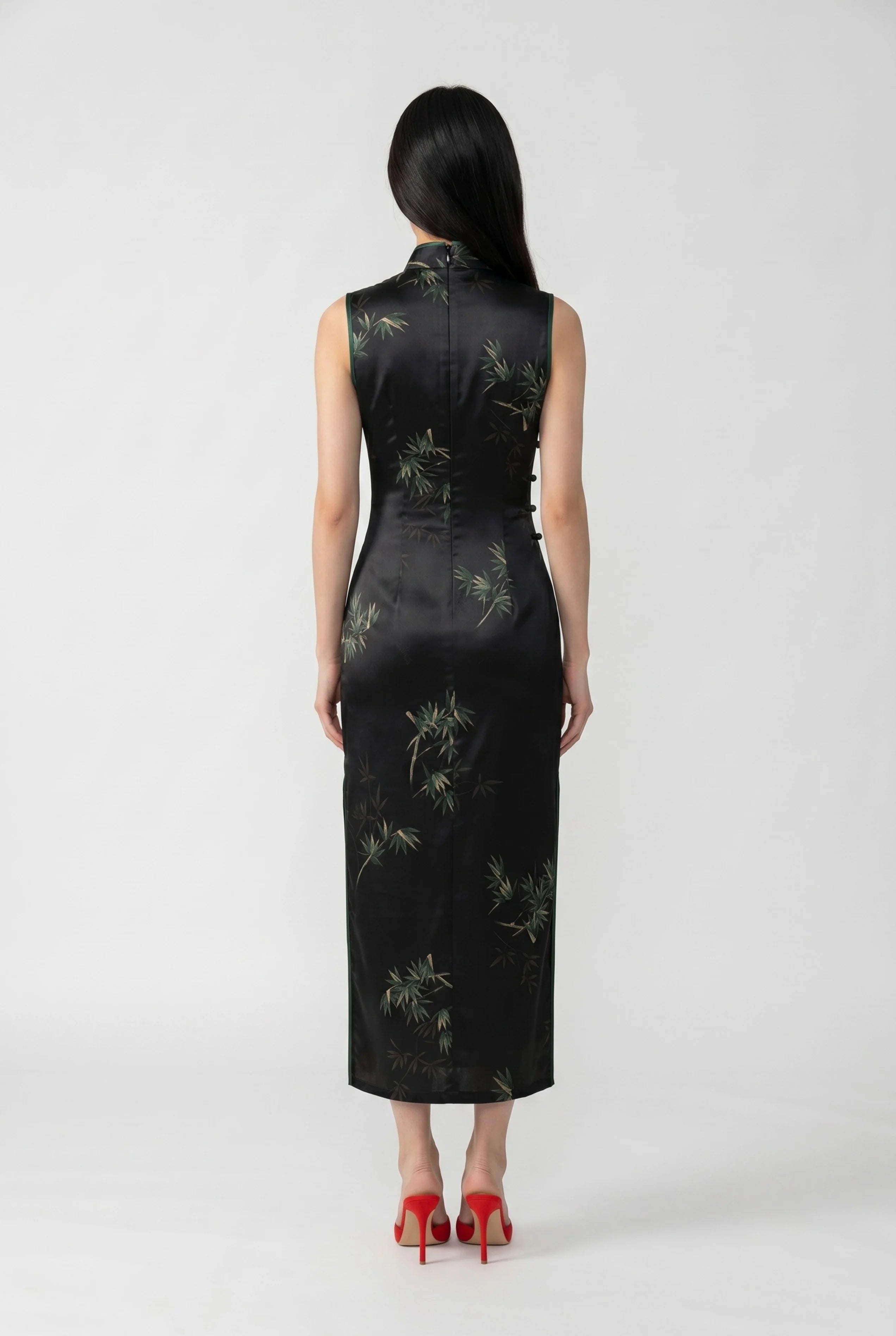 Full-length back view of the black women qipao showing the tailored ankle-length silhouette