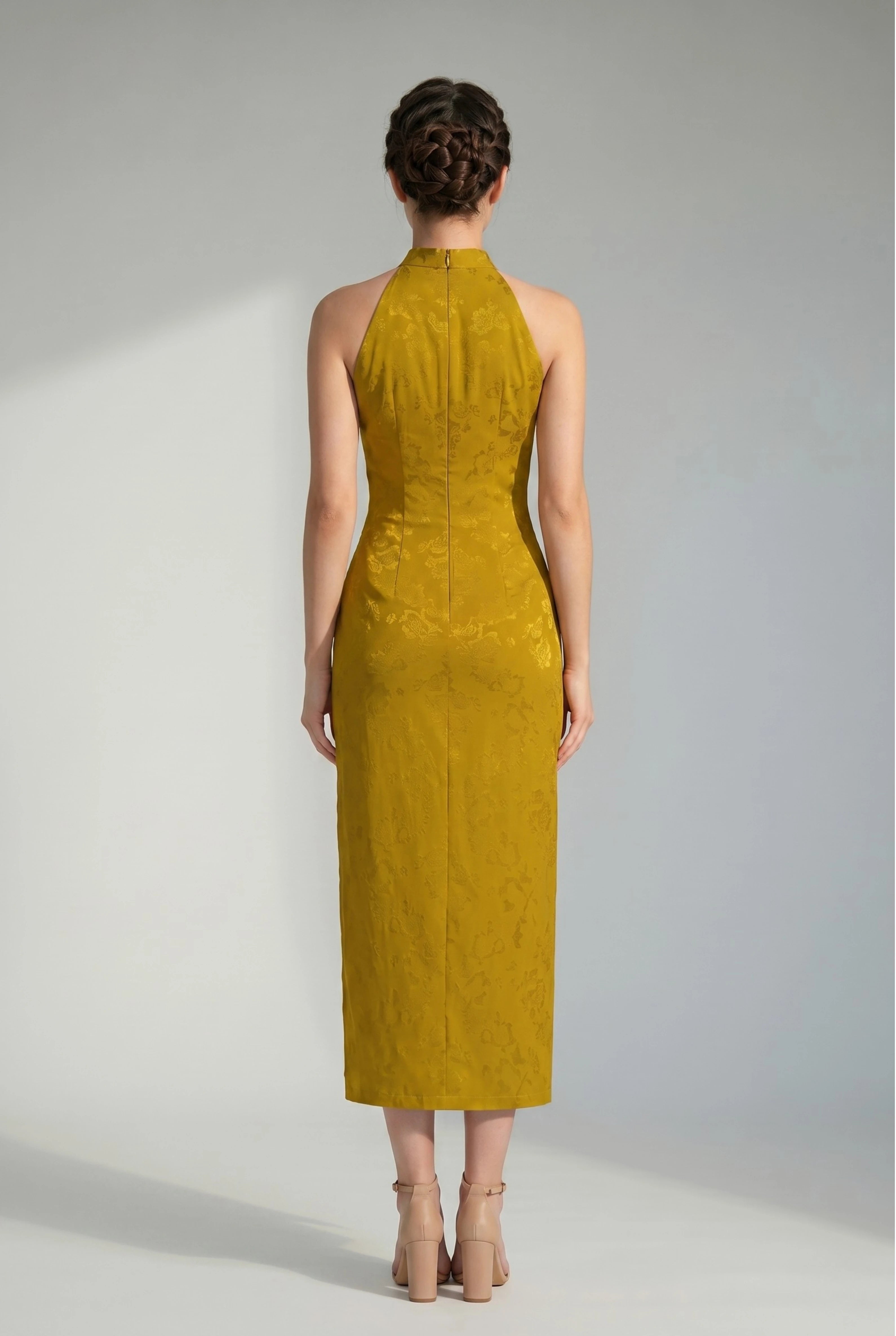 Back full-length view of the yellow Chinese style dress showing the high halter back design